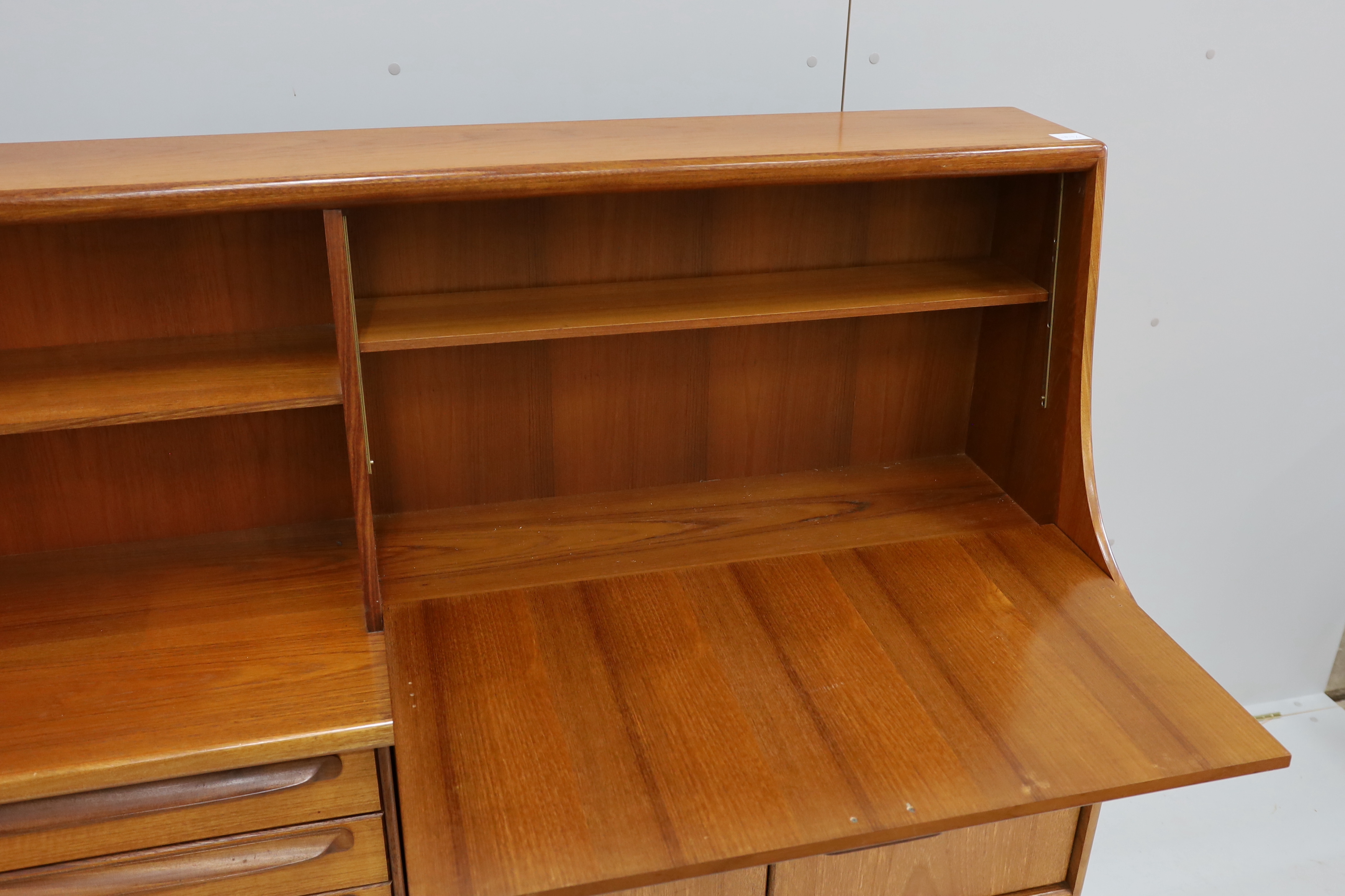 John Herbert for Younger Furniture - A teak high sideboard, width 145cm, depth 46cm, height 130cm